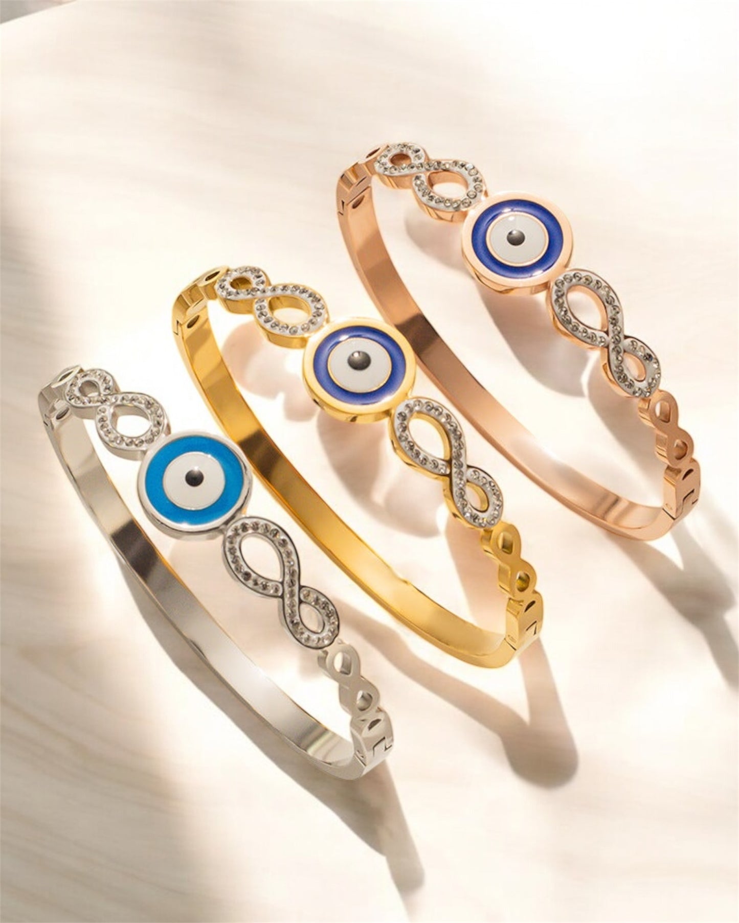 Round Devil’s Eye Bangle – 18K Gold Plated Titanium Steel