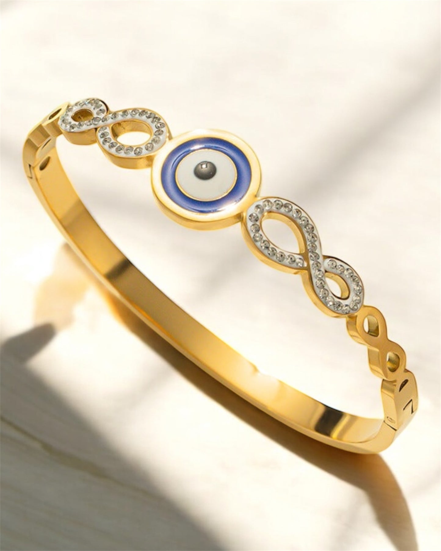 Round Devil’s Eye Bangle – 18K Gold Plated Titanium Steel
